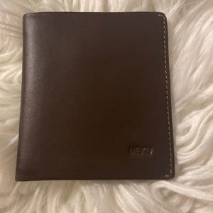 MEKU Man Wallet size 7” long 4” wide excellent condition never been used
